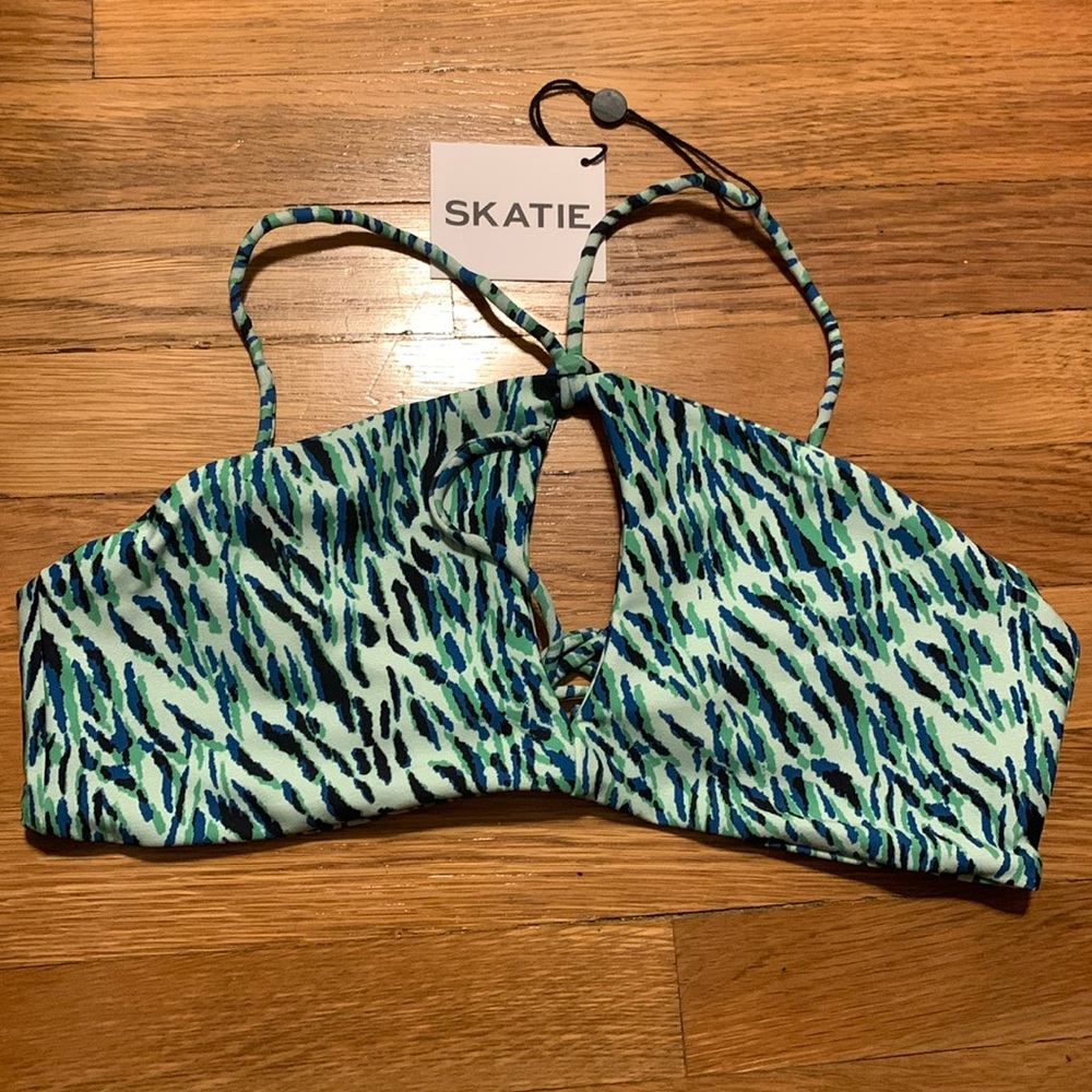 Skatie bikini top medium green color tie back.